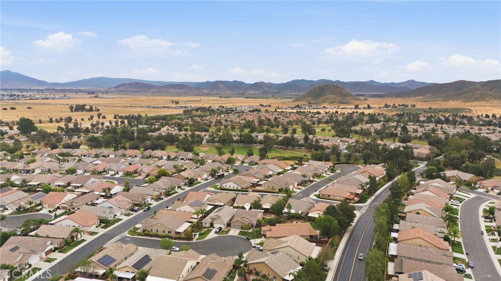 7975 Doyle Circle Hemet, CA 92545 - Photo 27 of 29 an aerial view of residential house with outdoor space and mountain view