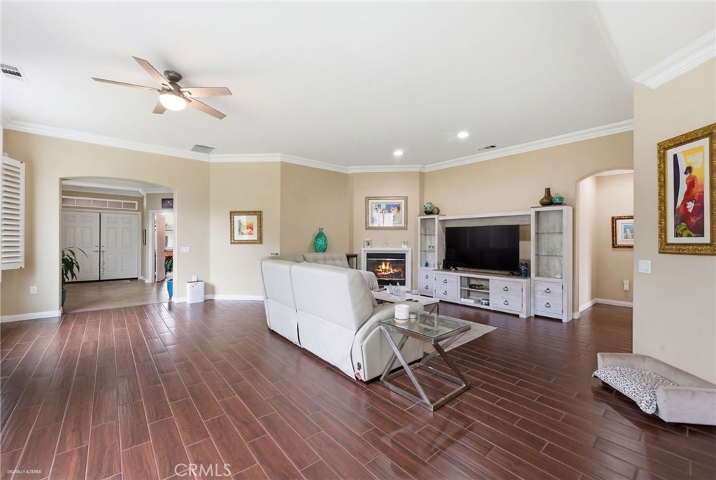 7975 Doyle Circle Hemet, CA 92545 - Photo 5 of 29 a living room with furniture and a flat screen tv