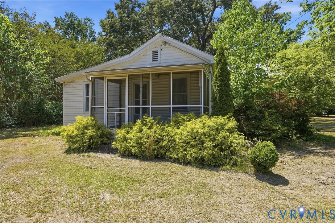 2350 Chelsea Road West Point, VA 23181 - Photo 10 of 34 a front view of a house with a yard
