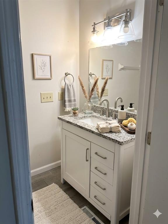 27 Carriage Trace Southeast Cartersville, GA 30121 - Photo 25 of 26 a bathroom with a granite countertop sink and a mirror