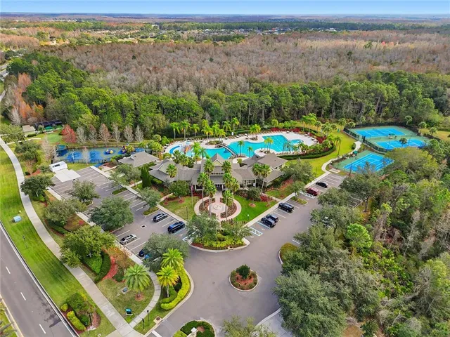 an aerial view of a swimming pool patio and mountain view