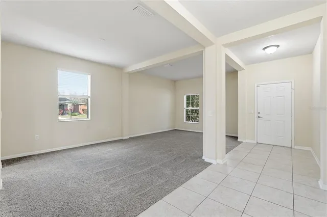 an empty room with a bathroom