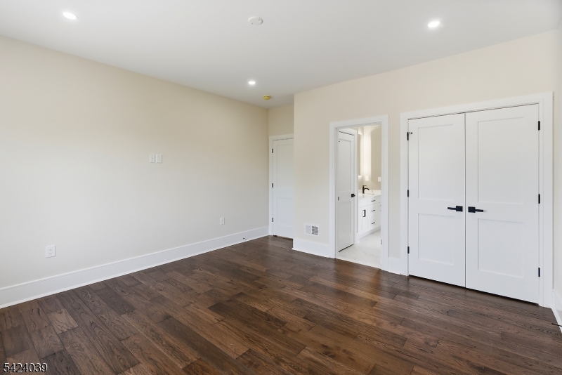 45 Kildee Road Belle Mead, NJ 08502 - Photo 17 of 43 a view of an empty room with wooden floor