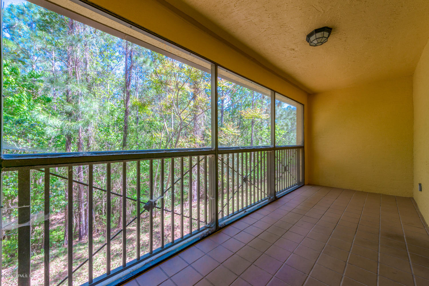 9745 Touchton Road, Unit 923 Jacksonville, FL 32246 - Photo 27 of 44 Screened Tile Balcony