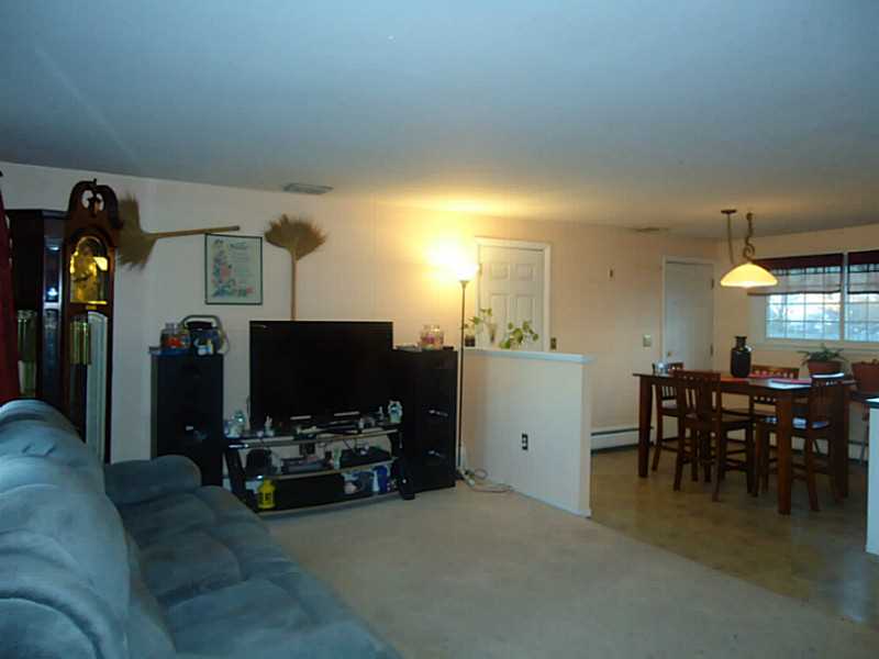 65 State Street Pawtucket, RI 02861 - Photo 10 of 22 Living Room. Living room looking into dining area