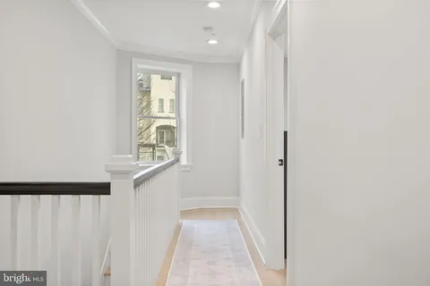 a very nice looking hallway with front door