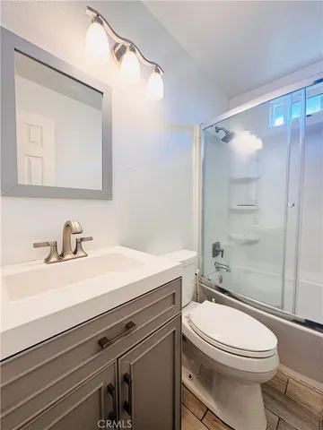 a living room filled with furniture and a play table