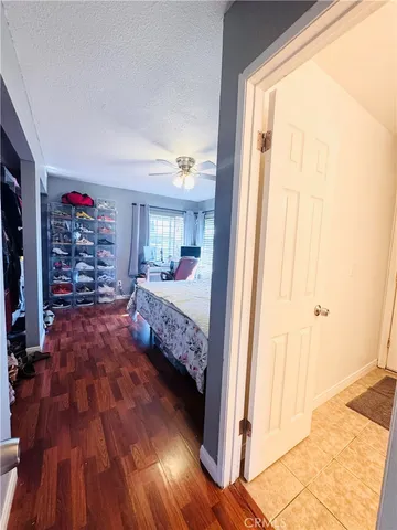 a bed room with a bed and a chandelier