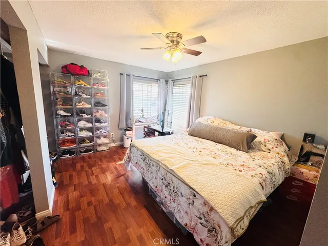 a bathroom with a sink a toilet a mirror and vanity