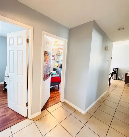 a view of a patio with table and chairs