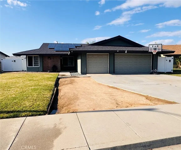 a house with yard in front of it