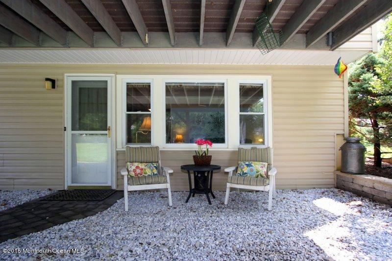 109 Jumping Brook Road Middletown, NJ 07738 - Photo 21 of 26 SITTING AREA UNDER DECK