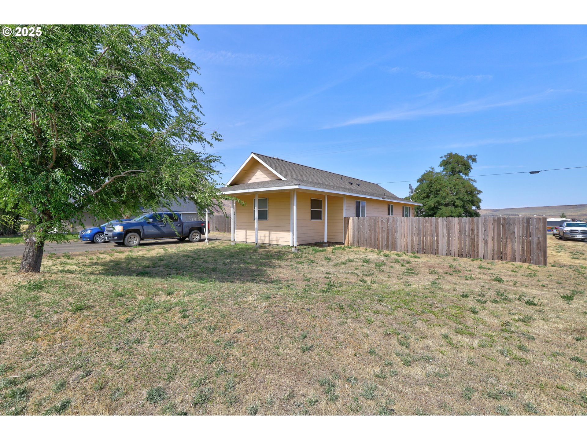 310 Columbia Avenue Roosevelt, WA 99356 - Photo 5 of 17 a view of a house with a yard