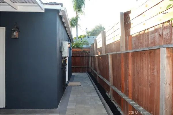 a view of a balcony with wooden floor