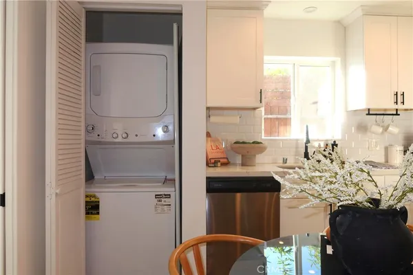 a bathroom with a sink a mirror and shower