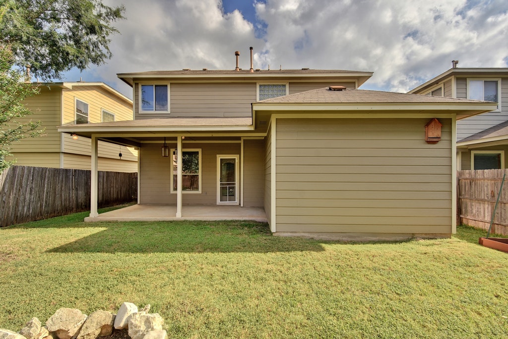2201 Keepsake Drive Austin, TX 78745 - Photo 23 of 25 a view of a house with wooden fence