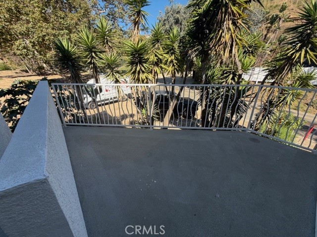 3709 Las Flores Canyon Road, Unit D Malibu, CA 90265 - Photo 26 of 33 a view of balcony with tree