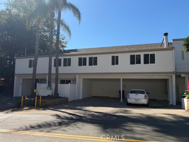 3709 Las Flores Canyon Road, Unit D Malibu, CA 90265 - Photo 29 of 33 a front view of a house with a parking space