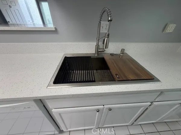 a close view of a sink in the counter