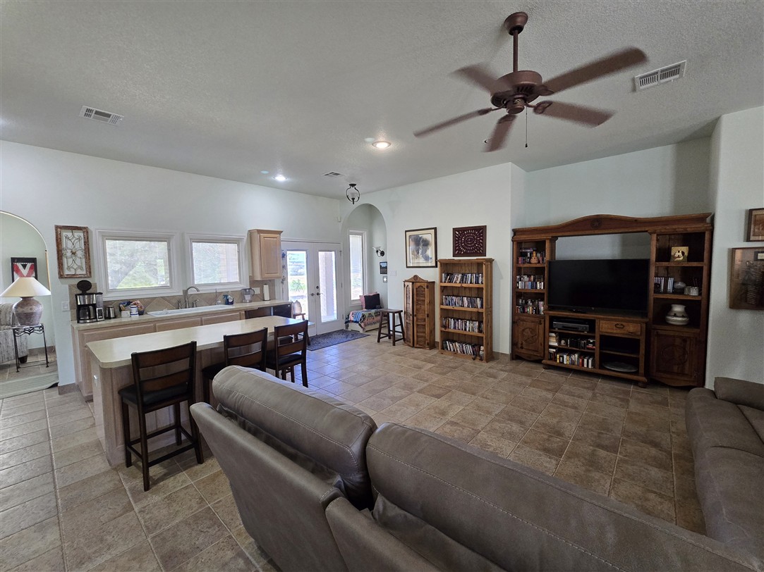 543 County Road 4620 Kempner, TX 76539 - Photo 19 of 36 a living room with furniture and a flat screen tv