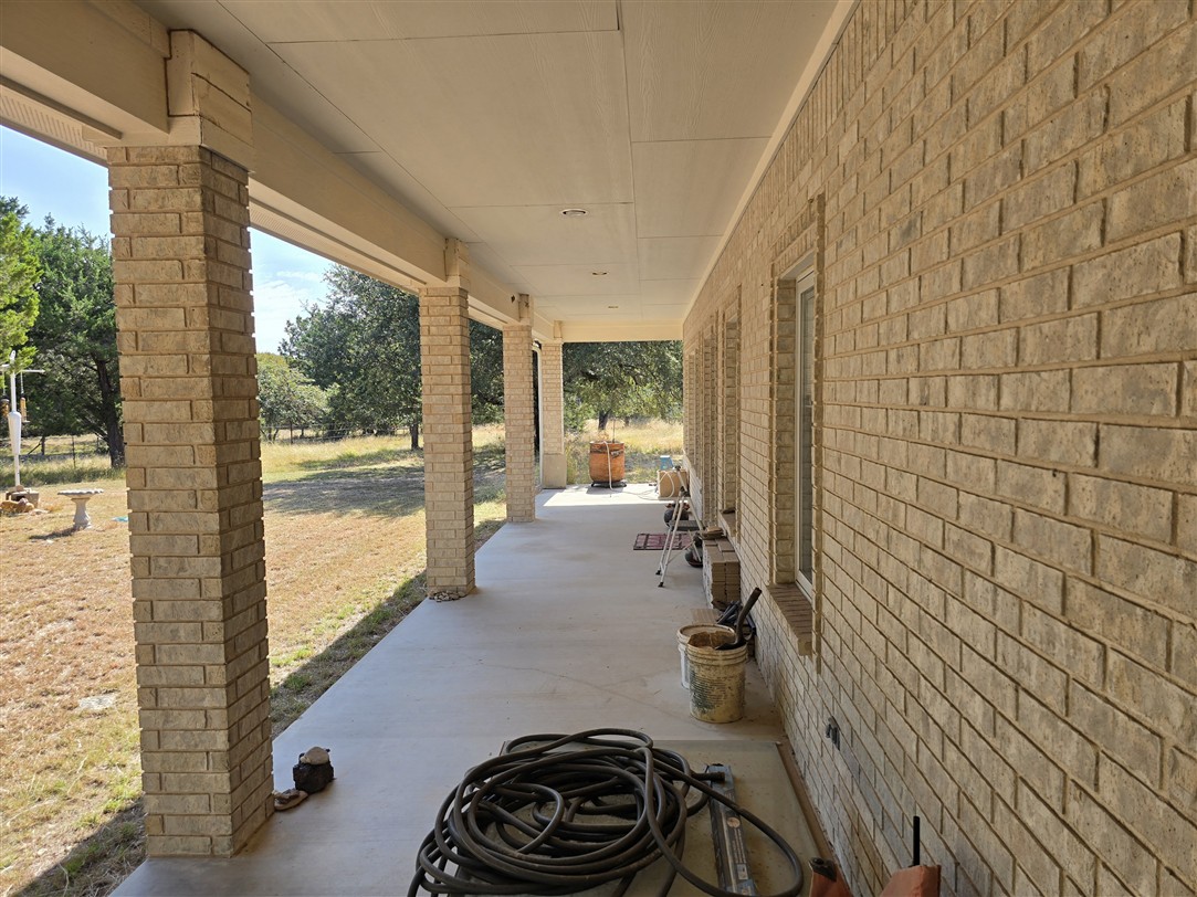543 County Road 4620 Kempner, TX 76539 - Photo 8 of 36 a room with a couch and a large window with garden view