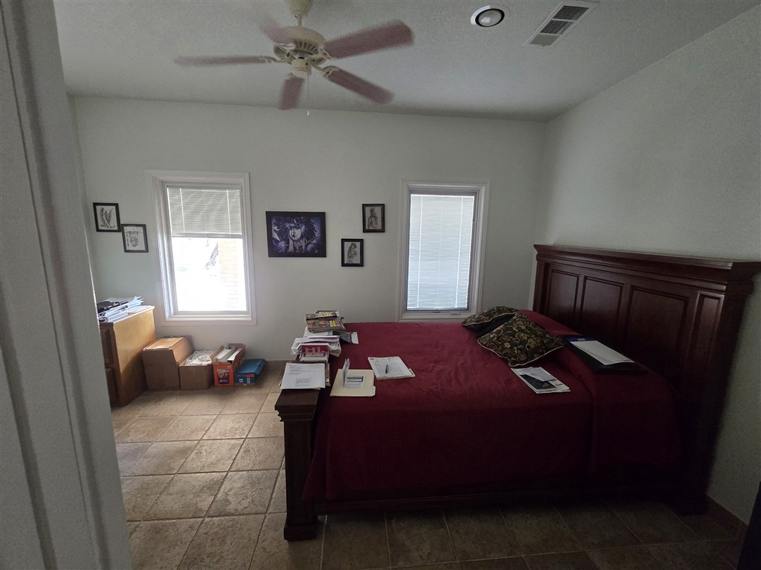 543 County Road 4620 Kempner, TX 76539 - Photo 10 of 36 a bedroom with a bed and window