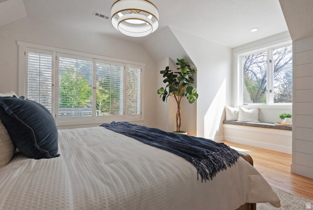 16 Gatehouse Lane Sandy, UT 84092 - Photo 23 of 73 Oversized En suite primary Bedroom featuring vaulted ceiling, multiple windows, and bench seating.