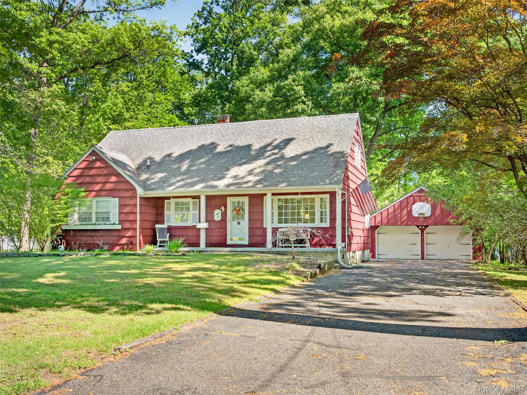 56 Oak Road New City, NY 10956 - Photo 2 of 30 a view of a house with a big yard and large trees