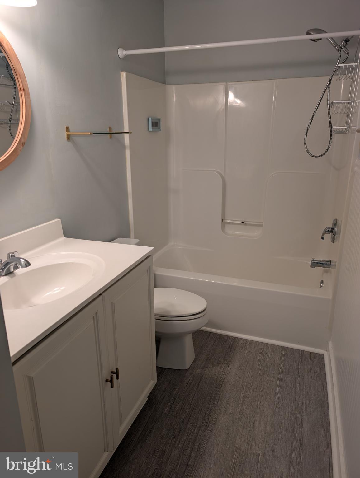 204 River Birch Circle, Unit 204 Kennett Square, PA 19348 - Photo 11 of 24 a bathroom with a sink toilet and shower