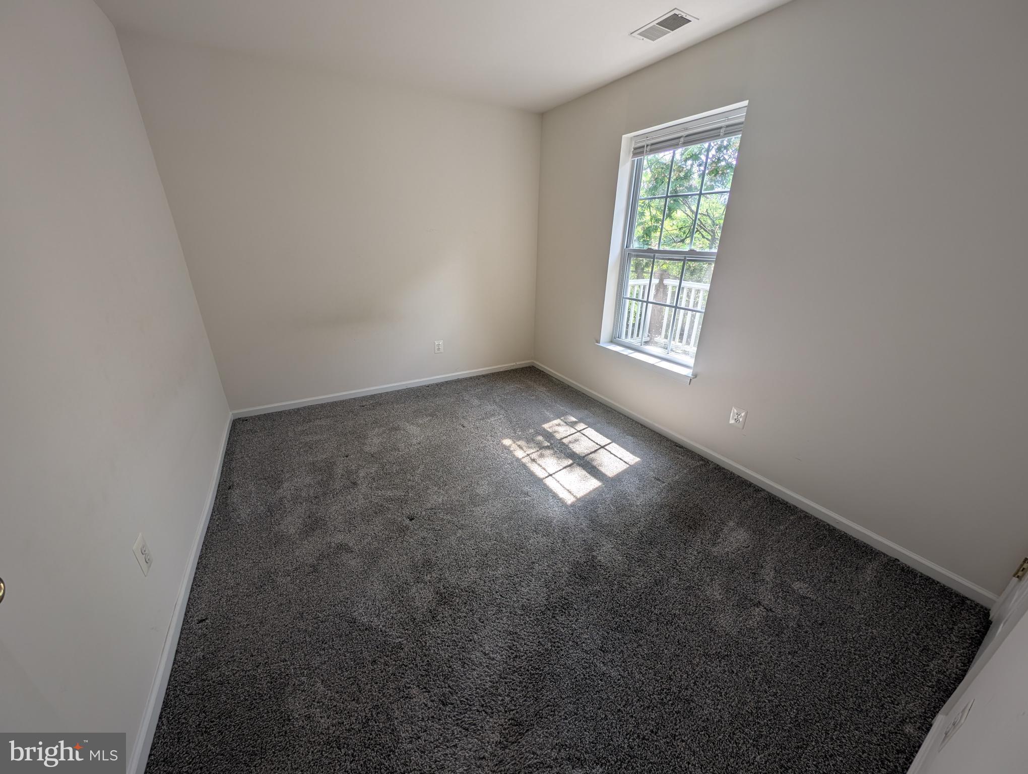 204 River Birch Circle, Unit 204 Kennett Square, PA 19348 - Photo 13 of 24 an empty room with a window