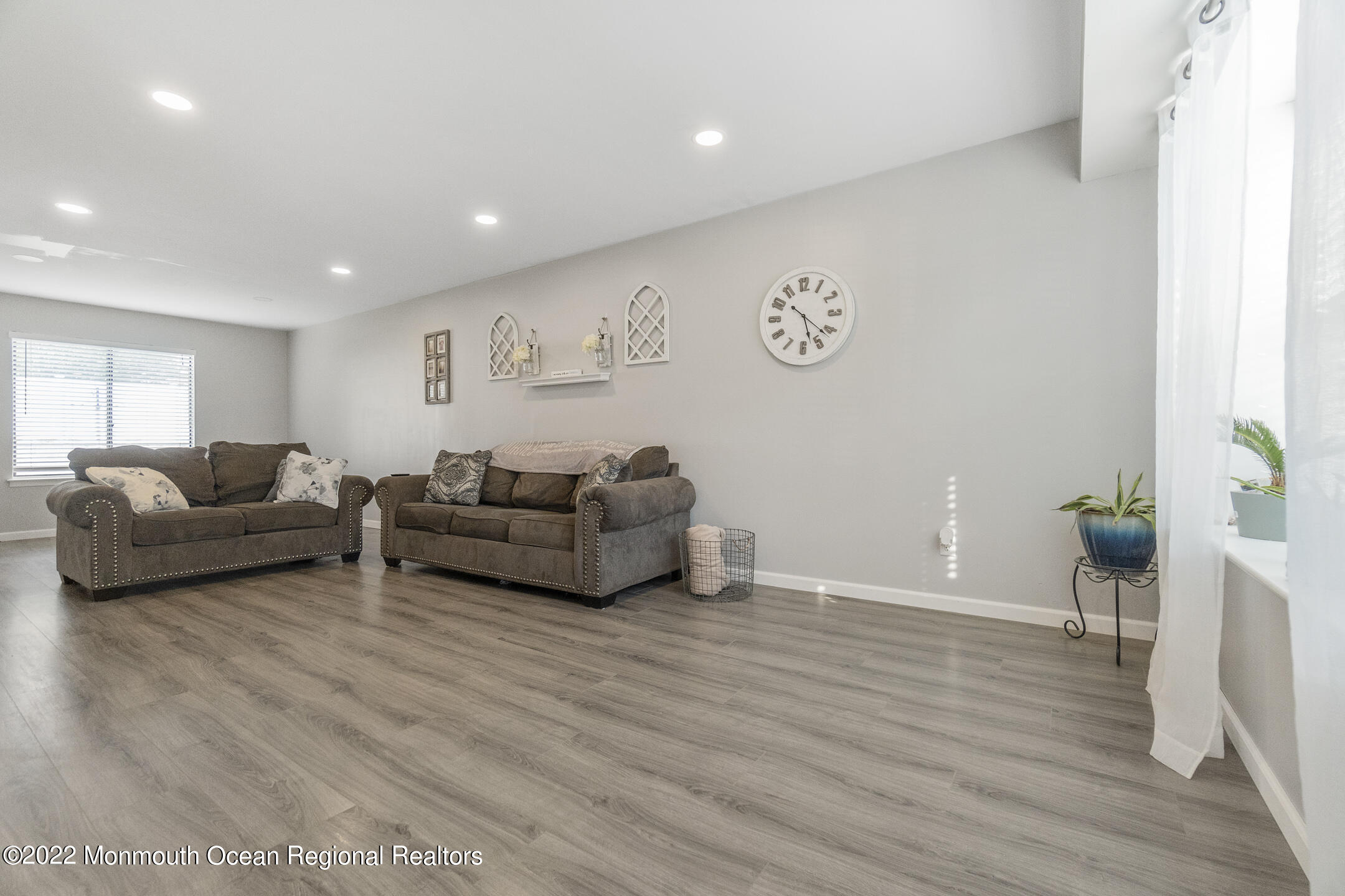 94 Starlight Road Howell, NJ 07731 - Photo 7 of 30 a living room with furniture and a wooden floor