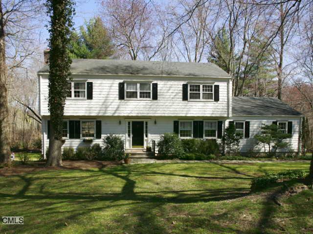 6 Lowlyn Road Westport, CT 06880 - Photo 1 of 1 a front view of a house with a yard