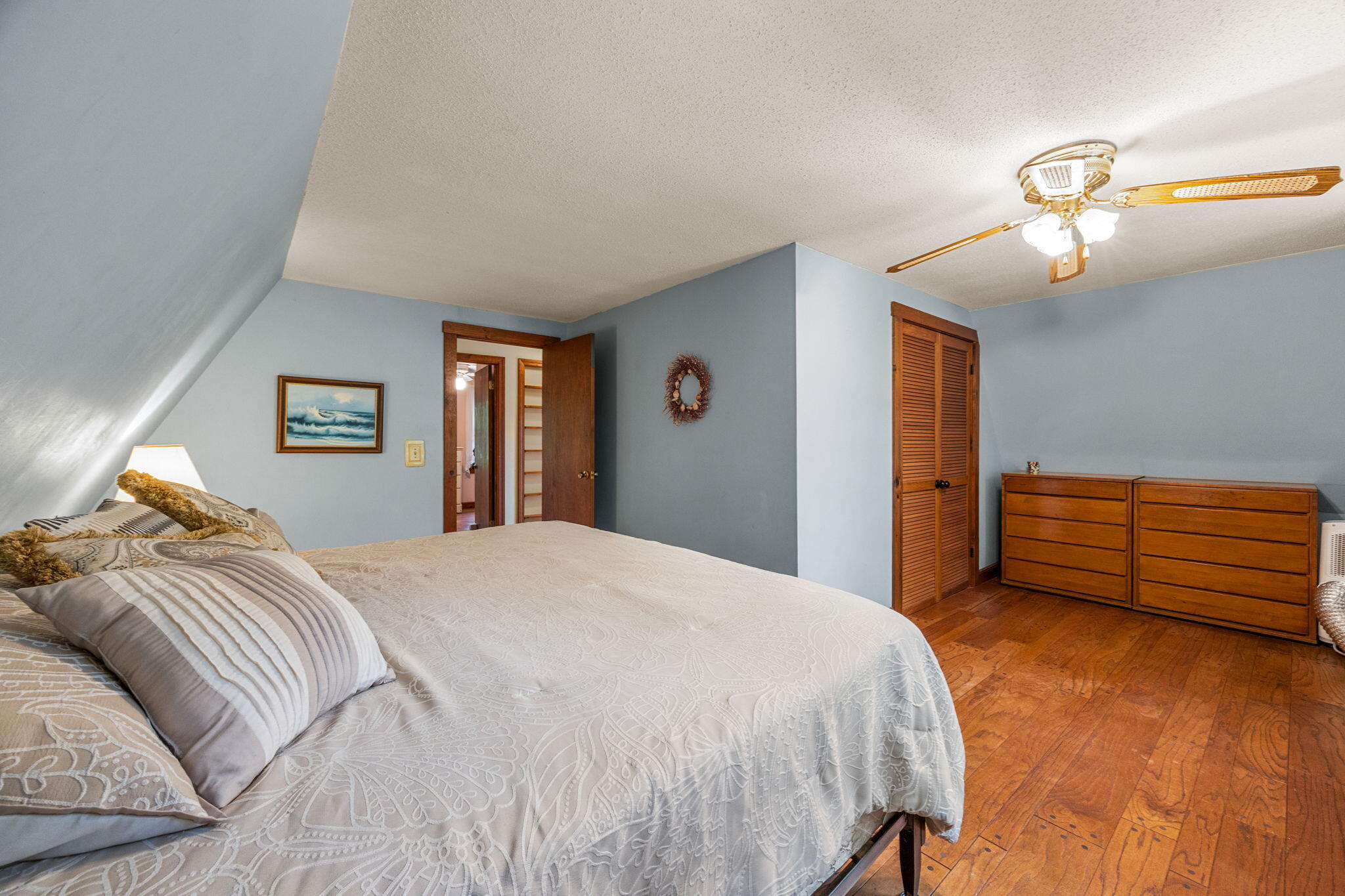 65 Cestaro Way Eastham, MA 02642 - Photo 24 of 37 a bedroom with a bed and a dresser