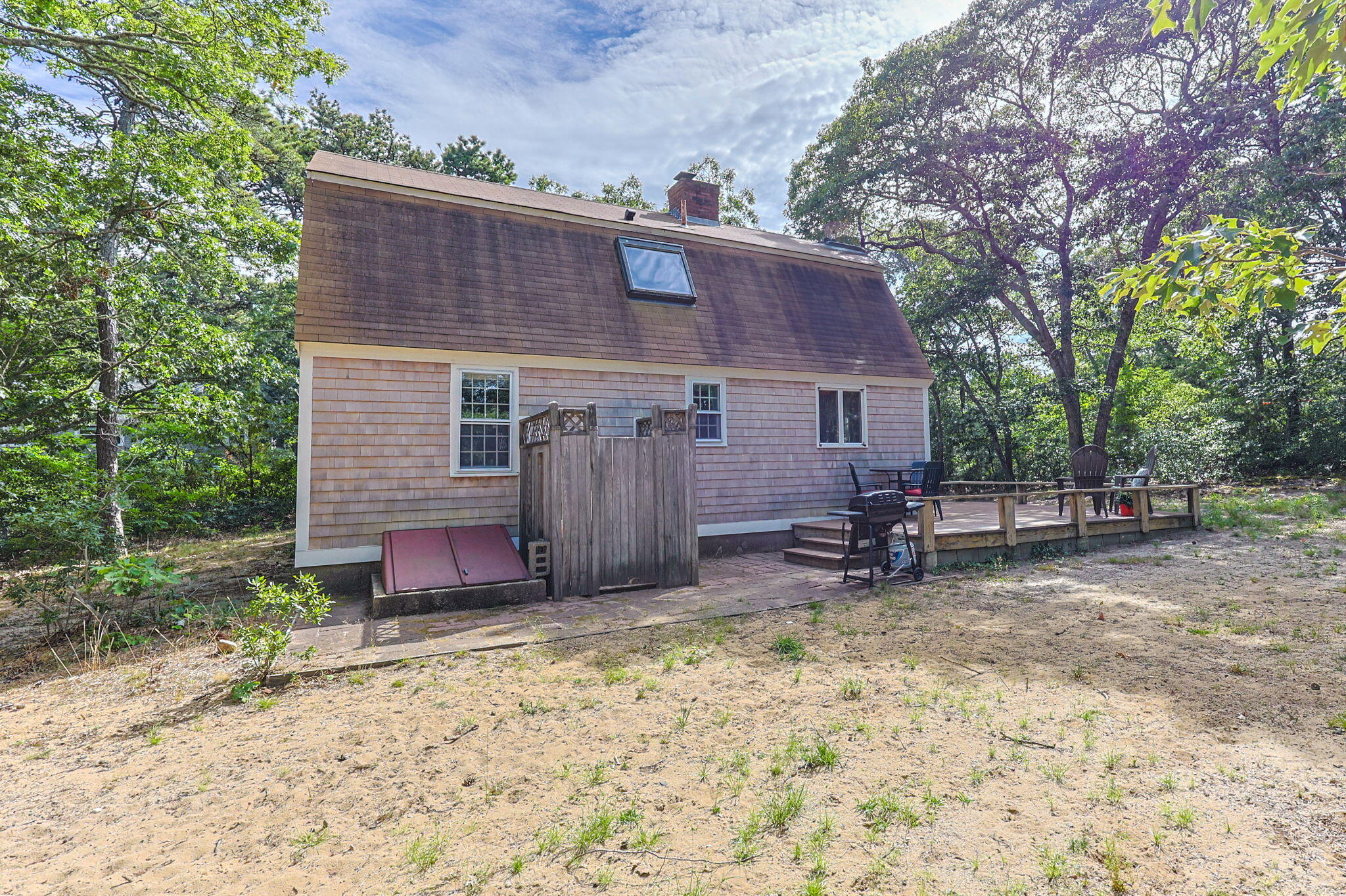 65 Cestaro Way Eastham, MA 02642 - Photo 32 of 37 front view of a house with a yard