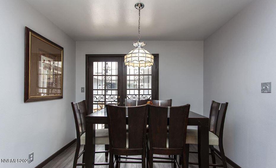 7050 Pembroke Drive Reno, NV 89502 - Photo 12 of 32 a view of a dining room with furniture window and outside view