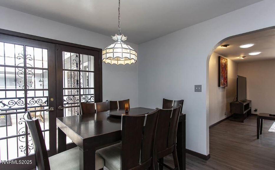 7050 Pembroke Drive Reno, NV 89502 - Photo 13 of 32 a view of a dining room with furniture window and wooden floor