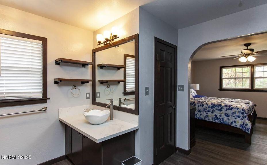 7050 Pembroke Drive Reno, NV 89502 - Photo 16 of 32 a bedroom with a bed and a window