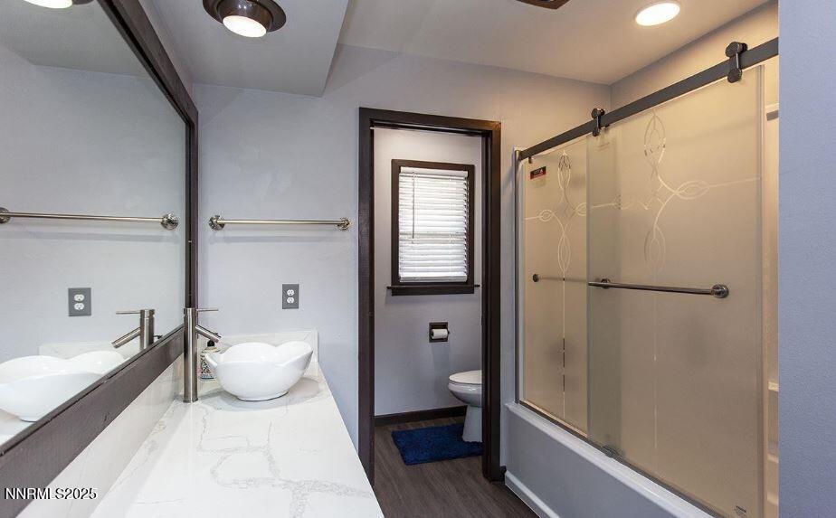 7050 Pembroke Drive Reno, NV 89502 - Photo 21 of 32 a bathroom with a bathtub and a shower