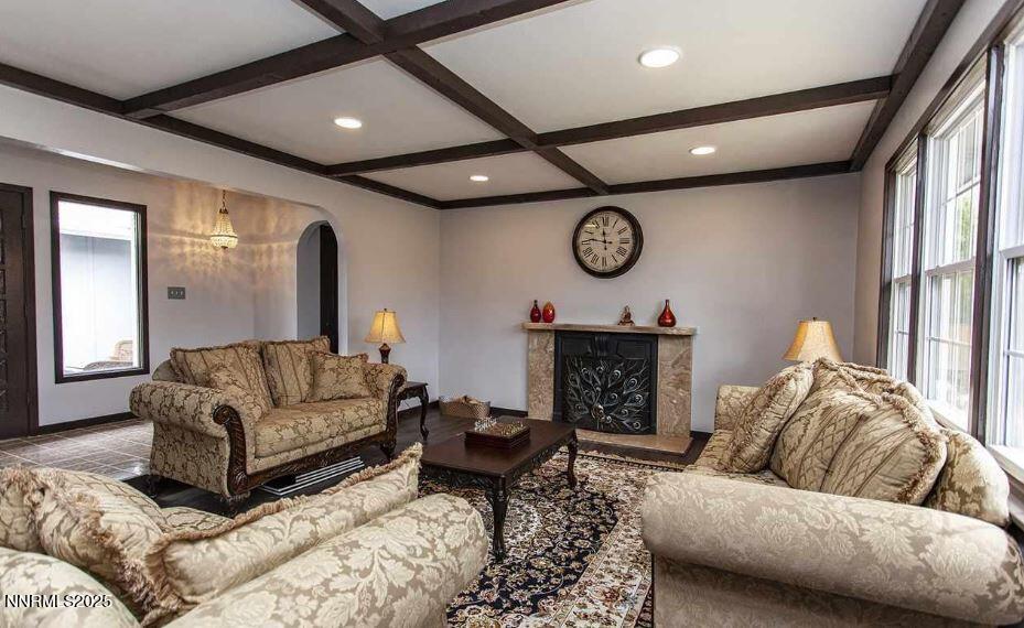 7050 Pembroke Drive Reno, NV 89502 - Photo 5 of 32 a living room with furniture and a fireplace