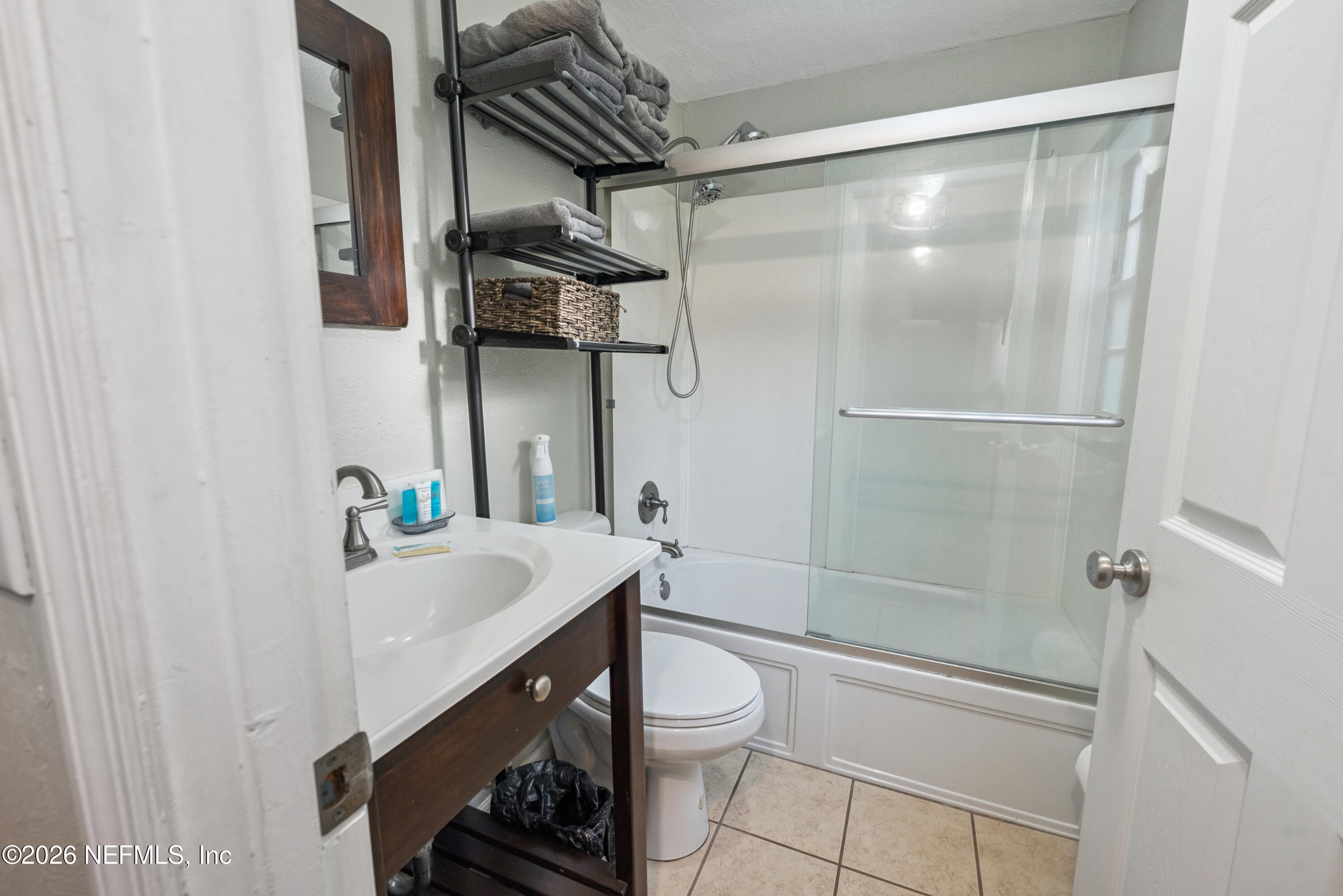 141 Southwest Longhorn Terrace Fort White, FL 32038 - Photo 16 of 31 a bathroom with a sink a toilet and shower