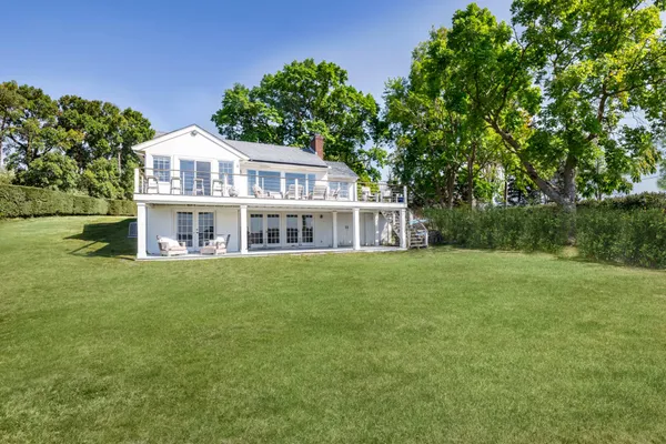 a view of a house with a big yard