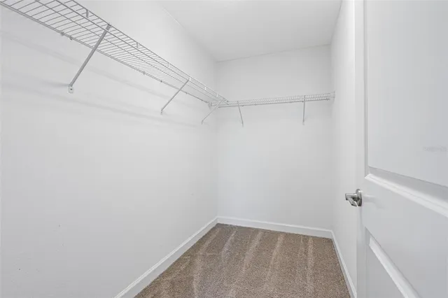 a view of a room with racks on the wall