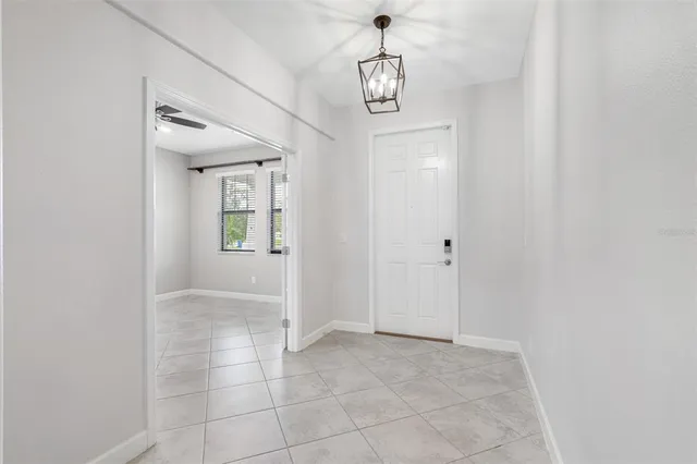 a view of a hallway with front door
