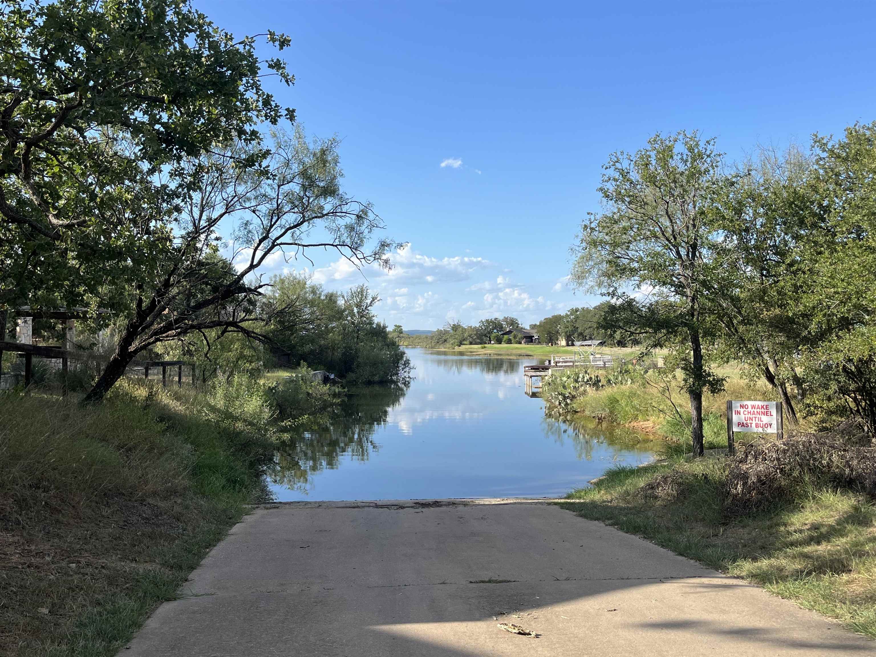 Tbd Lasso Loop Burnet, TX 78611 - Photo 7 of 11 a view of a lake with houses