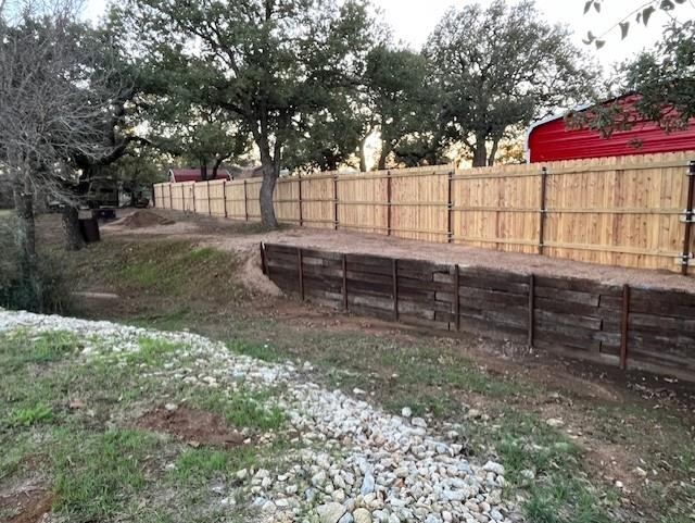 Tbd Lasso Loop Burnet, TX 78611 - Photo 9 of 11 a view of a yard with wooden fence
