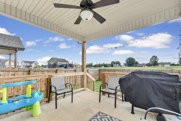 a view of a chairs and table in a terrace