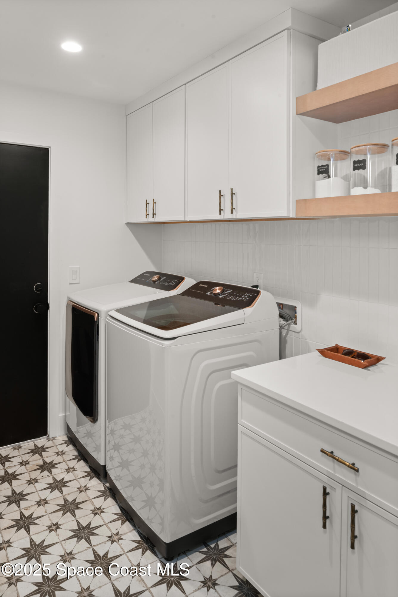 3425 Kent Drive Melbourne, FL 32935 - Photo 13 of 21 a utility room with dryer and washer