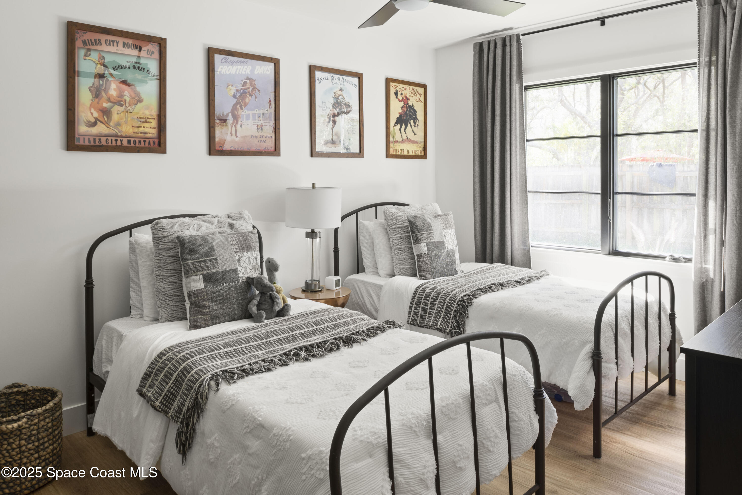 3425 Kent Drive Melbourne, FL 32935 - Photo 17 of 21 a bedroom with a bed and a large window