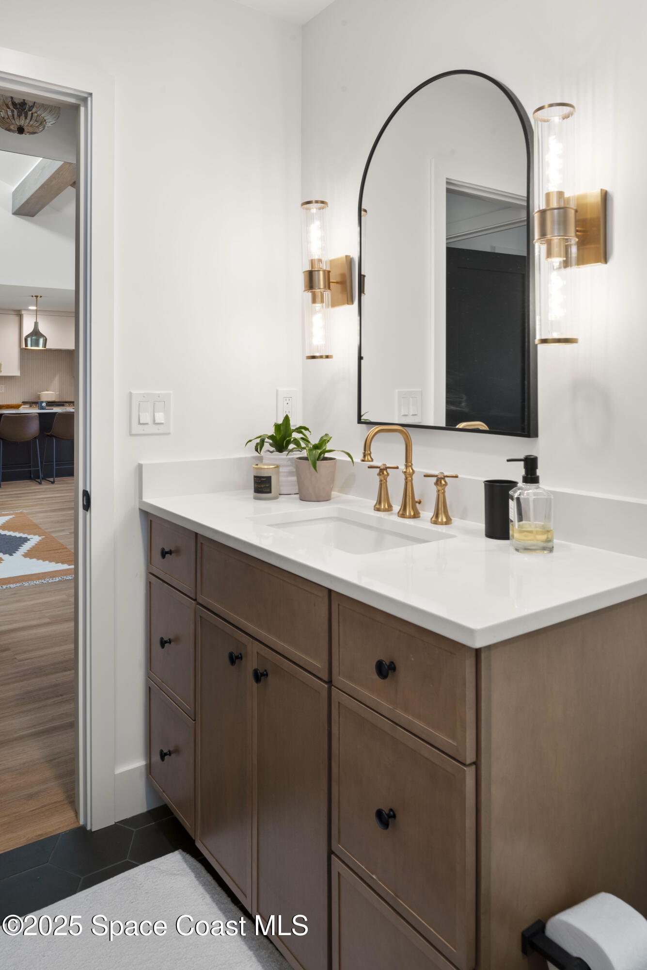 3425 Kent Drive Melbourne, FL 32935 - Photo 19 of 21 a bathroom with a sink and a mirror