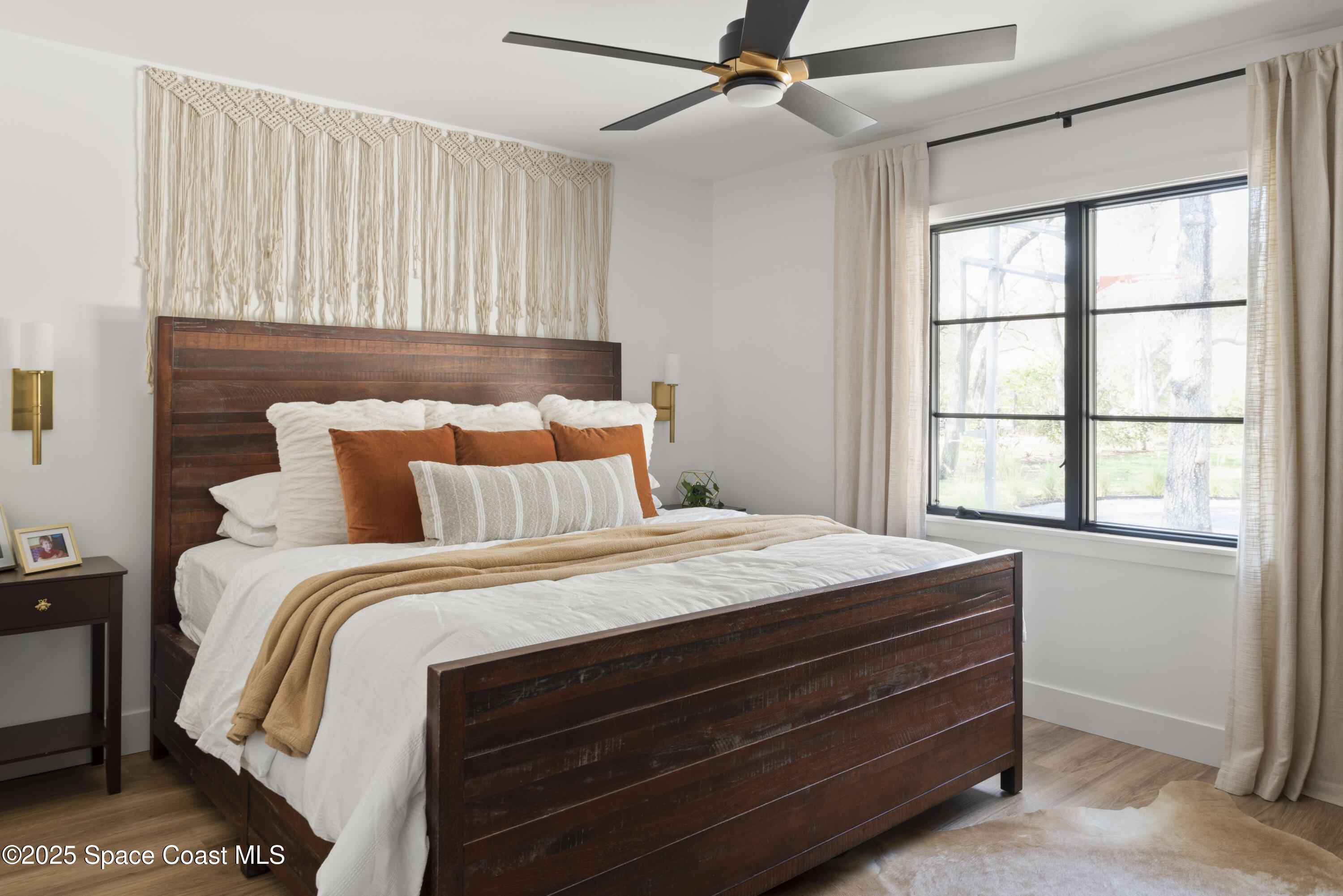 3425 Kent Drive Melbourne, FL 32935 - Photo 21 of 21 a bedroom with a bed and a window